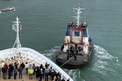 Guide boat negotiating the Giudecca Canal
